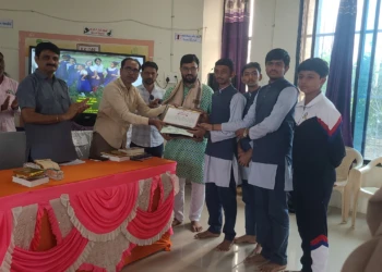 District Education Officer Presenting The Best And Cleanest School Award To The School District Education Officer Presenting The Best And Cleanest School Award To The School